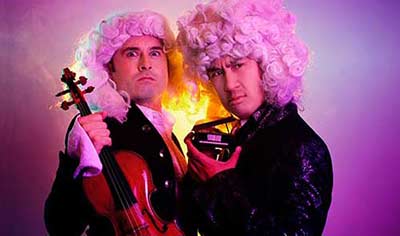 Mesa Arts Center with two violinists dressed in baroque costume